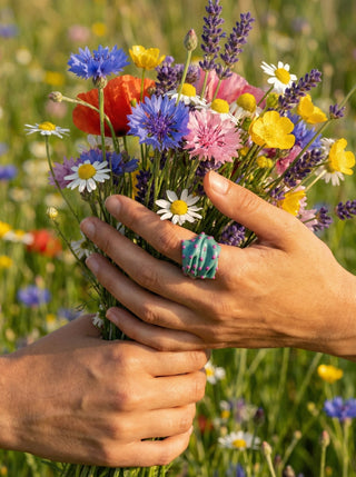 Efemera Wild Flower ring - teal enamel with pink dots - hands only detail